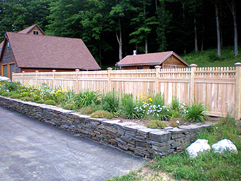 Privacy Fence with Rock Garden